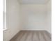 Cozy carpeted bedroom with a window offering natural light at 448 La Maison Ave # 19, Wendell, NC 27591