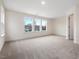 Spacious bedroom with ample natural light and carpet at 448 La Maison Ave # 19, Wendell, NC 27591