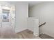 Bright hallway with carpeted floors and access to bedrooms at 448 La Maison Ave # 19, Wendell, NC 27591