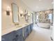Luxurious primary bathroom with dual vanities, soaking tub, and a stunning marble shower at 7208 Tanbark Way, Raleigh, NC 27615