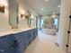 Luxurious bathroom with double vanity, soaking tub, and large tiled shower at 7208 Tanbark Way, Raleigh, NC 27615