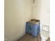 Half bathroom with marble countertop and toilet in new construction home at 7208 Tanbark Way, Raleigh, NC 27615