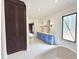 Bright bathroom featuring a large tub, dual vanity and a large window that provides plenty of natural light at 7208 Tanbark Way, Raleigh, NC 27615