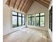 Bonus room featuring three windows and a vaulted ceiling at 7208 Tanbark Way, Raleigh, NC 27615