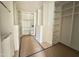 Walk-in closet featuring extensive shelving, drawers, and hanging space for optimal organization at 7208 Tanbark Way, Raleigh, NC 27615