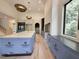 Bright, large kitchen boasting a center island, plenty of cabinets, and natural light at 7208 Tanbark Way, Raleigh, NC 27615