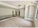 Spacious loft area with built-in bookcase and open area at 7208 Tanbark Way, Raleigh, NC 27615