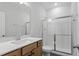 Bathroom featuring vanity with a single sink and shower with a glass door at 100 Bold Dr, Youngsville, NC 27596