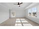 Spacious bedroom featuring carpet floors and natural light at 100 Bold Dr, Youngsville, NC 27596