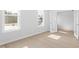 Sunlit bedroom featuring hardwood floors, neutral paint and bright windows at 100 Bold Dr, Youngsville, NC 27596