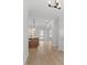 Bright entryway with hardwood floors leading to an open-concept layout at 100 Bold Dr, Youngsville, NC 27596