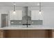 Modern kitchen featuring white cabinets, stainless steel appliances, and center island at 100 Bold Dr, Youngsville, NC 27596