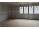 Bedroom featuring natural light from three windows with neighborhood views; under construction at 126 Harvest Ln, Pittsboro, NC 27312