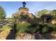 Elegant brick entrance to community featuring beautiful landscaping at 126 Harvest Ln, Pittsboro, NC 27312