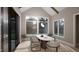 Bright dining room features a vaulted ceiling, hardwood floors, and a large window at 126 Harvest Ln, Pittsboro, NC 27312