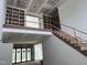 Entryway of home under construction with a staircase leading to a second-floor landing and built-in shelving at 126 Harvest Ln, Pittsboro, NC 27312