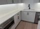 Modern kitchen featuring stainless steel appliances, white cabinets and a stylish black faucet at 126 Harvest Ln, Pittsboro, NC 27312