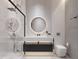 Sleek bathroom featuring black fixtures, a glass walk-in shower and a bright round mirror at 5909 Tower Grove Dr, Raleigh, NC 27614