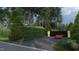 Private gated entrance with landscaping at 5909 Tower Grove Dr, Raleigh, NC 27614