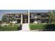 Modern two-story home with sleek design, expansive windows, and landscaped grounds at 5909 Tower Grove Dr, Raleigh, NC 27614