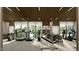 Well-equipped home gym with various exercise machines and equipment, offering a convenient fitness space at 5909 Tower Grove Dr, Raleigh, NC 27614