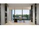 Home office with built-in bookshelves, a modern desk, and a large window offering natural light at 5909 Tower Grove Dr, Raleigh, NC 27614