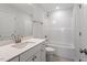 Bathroom featuring white cabinets, quartz countertops, tub and shower combo, and tile flooring at 90 Bold Dr, Youngsville, NC 27596