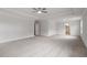 Large bedroom features plush carpeting and tray ceiling with access to the bathroom at 90 Bold Dr, Youngsville, NC 27596