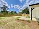 A spacious fenced backyard, featuring a concrete patio for entertaining and landscaping potential at 247 Jenkins St, Erwin, NC 28334