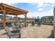 Community area with picnic tables and chairs overlooking the playground and community homes at 191 Anise Ln, Garner, NC 27529