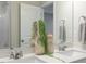Bathroom featuring double sinks with modern faucets and a shower reflected in the mirror at 195 Anise Ln, Garner, NC 27529