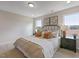 Beautiful bedroom with neutral walls, carpet, and a large window for natural light at 195 Anise Ln, Garner, NC 27529