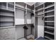 Organized closet featuring open shelving, drawers, and hanging rods providing ample storage space at 620 Wade Ave # 301, Raleigh, NC 27605