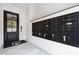 Secure mail room featuring individual mailboxes, a stylish entrance door, and well-lit interior at 620 Wade Ave # 301, Raleigh, NC 27605