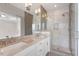 Luxurious bathroom featuring a large shower, double vanity and granite countertop at 836 Bankston Woods Way, Raleigh, NC 27609