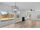 Bright and spacious living room featuring a fireplace, hardwood floors, recessed lights and sliding glass doors at 2820 Lacy Holt Rd, Graham, NC 27253