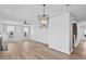 Inviting living room featuring recessed lights, hardwood floors, and stairs leading to upper level at 2820 Lacy Holt Rd, Graham, NC 27253