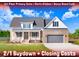 Brick home with gray garage door and front porch at 46 Otter Hole Dr, Princeton, NC 27569