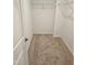 Spacious walk-in closet featuring carpeted floor and wire shelving at 1343 Bessie Ct, Wake Forest, NC 27587