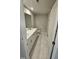 Modern bathroom featuring a double vanity, sleek fixtures, and beautiful marble-look tile floors at 1349 Bessie Ct, Wake Forest, NC 27587