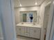 Bathroom with a double vanity and large mirror at 1351 Bessie Ct, Wake Forest, NC 27587