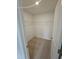 Walk-in closet with wire shelving and carpeted floor at 1351 Bessie Ct, Wake Forest, NC 27587