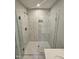 Contemporary tiled shower with glass enclosure at 1351 Bessie Ct, Wake Forest, NC 27587