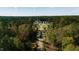 An aerial view of homes nestled in a lush, green, planned community at 4804 Parker Meadow Dr, Raleigh, NC 27614
