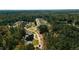 A beautiful aerial view shows homes, trees, and landscaping in a planned community at 4804 Parker Meadow Dr, Raleigh, NC 27614