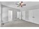 Well-lit bedroom with multiple closets and attached bathroom at 119 Water Ave, Wake Forest, NC 27587
