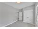 Spacious bedroom with double doors and access to hallway at 119 Water Ave, Wake Forest, NC 27587