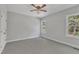 Bright bedroom featuring neutral walls and carpeting at 119 Water Ave, Wake Forest, NC 27587