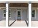 Front porch view of charming craftsman home at 119 Water Ave, Wake Forest, NC 27587