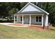 Newly built craftsman style home with front porch at 119 Water Ave, Wake Forest, NC 27587